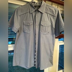 Buckle BKE Athletic Fit Men’s Large. Blue w/white stitching and Snap Buttons.